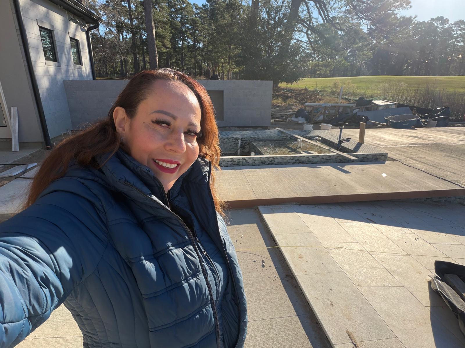 Giselle, owner of Concrete Creations LLC, on a Spring TX project site